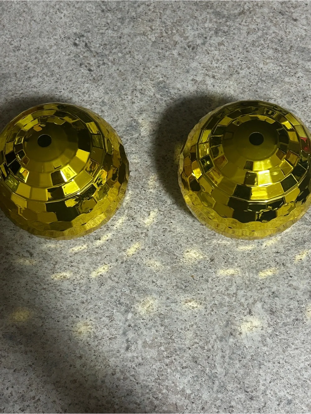 A set of 2 gold disco cups